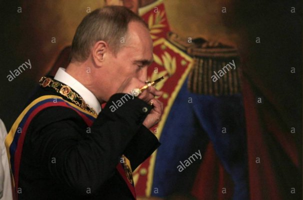 russian-prime-minister-vladimir-putin-kisses-a-replica-of-the-sword-FNFPAT.jpg