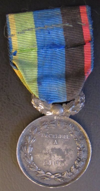 Медаль спасателей Департамент Эна рев.jpg
