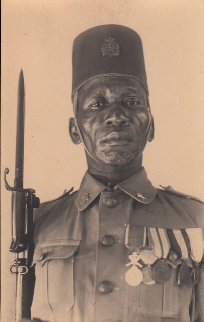 0              1930s-portrait-Belgian-Colonial-soldier-with-medals.jpg