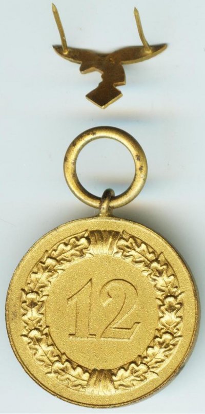 Медаль магнитная, орёл немагнитный 90е.jpg