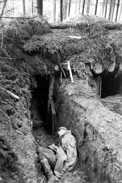 Dead German in a trench during the British Offensive in Holland - February 1945 .jpg